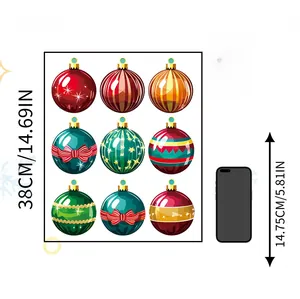 Detail view of 38cm Christmas ball wall stickers with smartphone for size reference