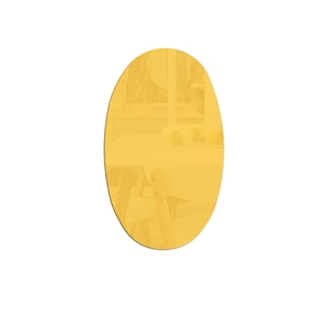 Close-up of golden oval acrylic mirror sticker showing clear reflective surface and smooth edges