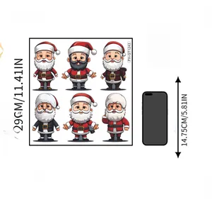 Size comparison of Christmas Santa Claus wall stickers next to a 5.8-inch mobile phone