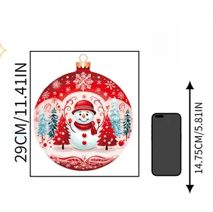 Christmas snowman wall sticker measuring 29cm shown with phone for size comparison
