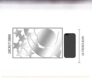 Size comparison of moon and star mirror wall stickers next to a mobile phone