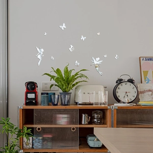 Detail of silver acrylic mirror wall stickers with fairy and butterfly decorative motifs