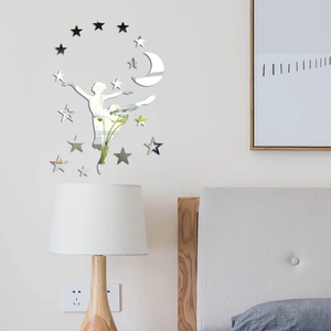 Mirror acrylic wall decals showing a ballet girl with moon and stars in a bedroom
