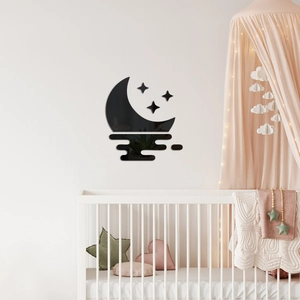 Schwarze Acryl Mond und Sterne Spiegel Wandaufkleber in einem gemütlichen Babyzimmer