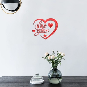 Macro view of red mirror acrylic heart wall sticker with I Love You lettering