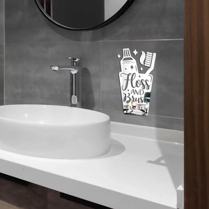 Modern acrylic mirror wall sticker showing Floss and Brush Your Teeth text detail