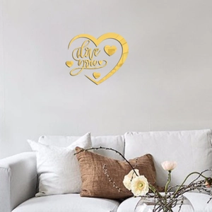 Golden acrylic 3D mirror wall sticker with Love You heart design in modern living room