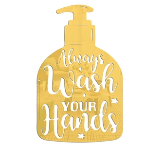 Macro detail of gold acrylic bathroom mirror sticker with Always Wash Your Hands lettering