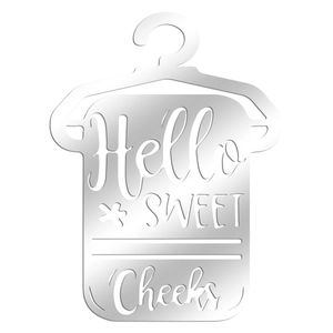Detail of silver mirror acrylic closet divider with Hello Sweet Cheeks cutout design