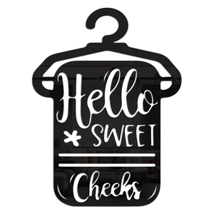 Modern acrylic mirror wall sticker featuring a hanger design and Hello Sweet Cheeks text
