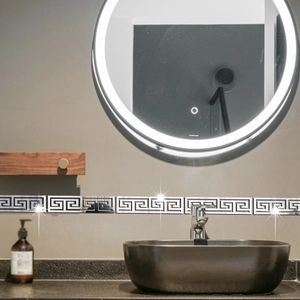 Silver meander pattern mirror wall stickers used as a decorative border in a modern bathroom