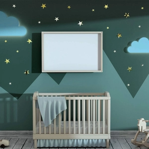 Adesivi murali 3D in acrilico a forma di stelle in una cameretta con decoro notturno
