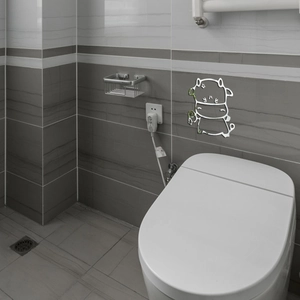 Detailed mirror wall sticker featuring a silver cartoon cow design on a bathroom tile wall