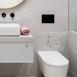 Mirror acrylic cartoon cow wall sticker showing silver metallic texture in a bathroom setting