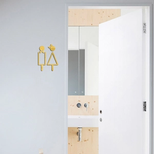 Detailed view of gold mirror acrylic restroom wall stickers in creative cartoon design