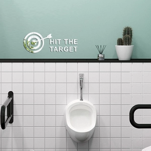 Close-up of Hit The Target acrylic mirror wall sticker on bathroom tiles