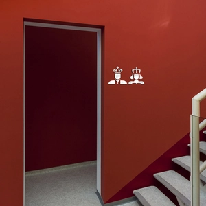 Close-up of silver mirror acrylic King and Queen silhouette wall stickers for bathroom decor
