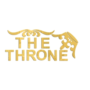 Vue macro d'un sticker mural en acrylique doré avec texte The Throne et décor couronne