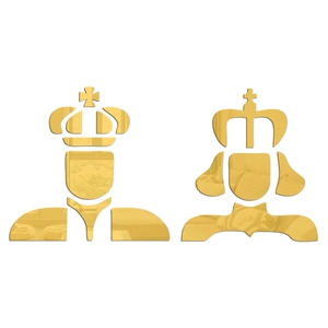 Macro detail of 3D gold mirror acrylic wall stickers with king and queen crown icons
