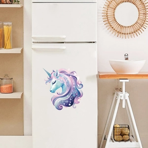 Dreamy unicorn wall decal with stars and galaxy motifs on a modern white refrigerator