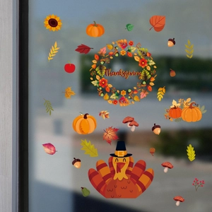 Vibrant Thanksgiving window clings showing turkey and pumpkins on glass surface