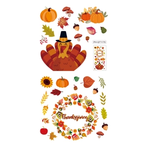Detail of Thanksgiving window stickers featuring turkey, maple leaves and pumpkin set