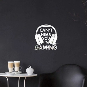 Détail d'un autocollant mural miroir en acrylique avec casque de jeu et texte design