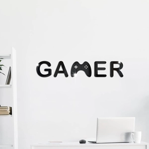 Detail of black acrylic gamer wall sticker with mirror finish showing gamepad icon