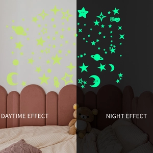 Glow in the dark star and moon wall stickers showing daytime and night fluorescence effects