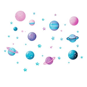Close-up of luminous cartoon planet and star wall stickers in pastel pink and blue colors