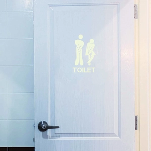 Leuchtender Toilettenaufkleber mit lustigen Figuren und TOILET-Schriftzug im Dunkeln