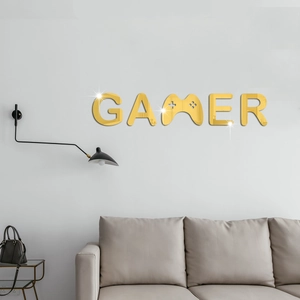 Modern gold mirror acrylic GAMER wall sticker with game controller detail on white wall