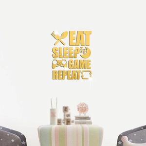 Dettaglio di adesivi murali specchiati oro Eat Sleep Game Repeat con icone gioco