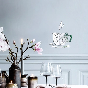 Macro detail of acrylic mirror coffee cup wall sticker with elegant leaf texture accents