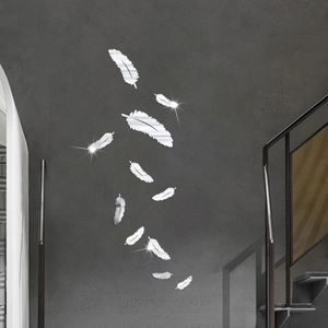 Detailed view of silver feather mirror wall stickers showing high reflective gloss finish