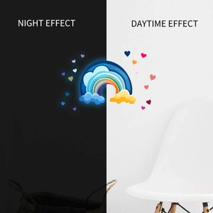 Glow-in-the-dark rainbow and cloud wall stickers showing day and night effect comparison