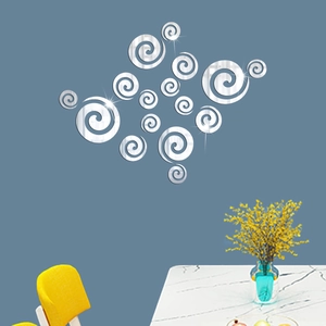 Détail des stickers muraux miroirs 3D en acrylique avec design en spirale argentée