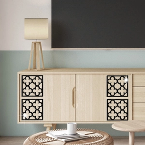 Black quatrefoil pattern acrylic wall stickers on wooden cabinet in a modern living room