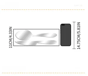 Size comparison showing 11cm acrylic cutlery wall sticker next to a mobile phone
