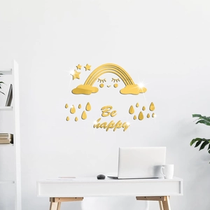 Macro detail of golden acrylic rainbow wall sticker set with stars and Be Happy text