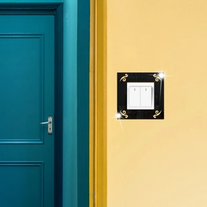 Decorative black mirror acrylic switch frame with gold scroll patterns for double switches