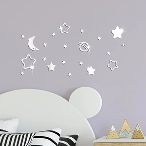 Detailed mirror silver moon and star acrylic wall stickers set on a bedroom wall