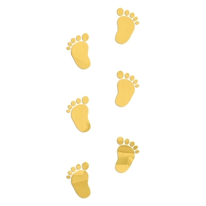 Detail view of gold acrylic mirror wall stickers in baby footprint shape, 6-piece set