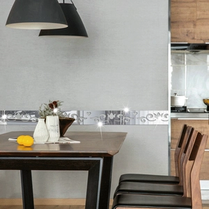 Detail of silver mirror acrylic wall stickers with hollow European floral heart patterns