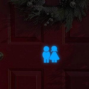 Glow-in-the-dark blue luminous bathroom wall stickers on a dark red wooden door