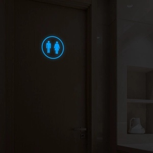 Glow in the dark blue luminous bathroom sign sticker on dark door for night guidance