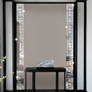 Symmetrische silberne Wandaufkleber mit Spiegeleffekt für moderne Wohnzimmerdekoration