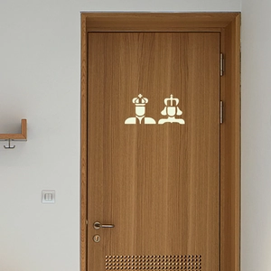 Luminous vinyl bathroom door stickers with King and Queen crown icons in minimalist white
