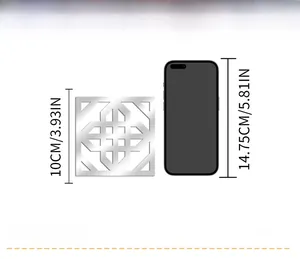 Detail view of 10cm silver hollow acrylic wall sticker with phone for size comparison