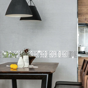Detail of silver acrylic mirror wall stickers with traditional geometric lattice pattern